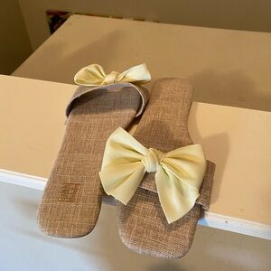 Tan size 10 sandals with bow
